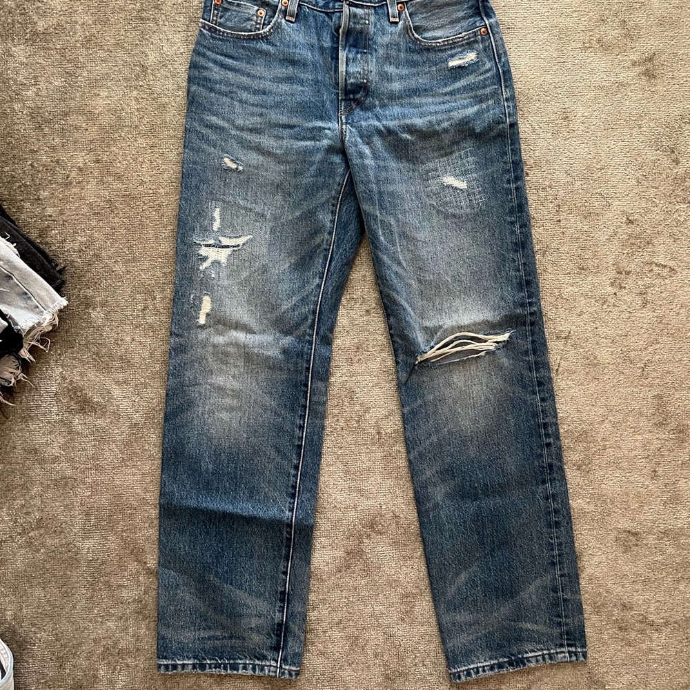 Distressed Blue Jeans